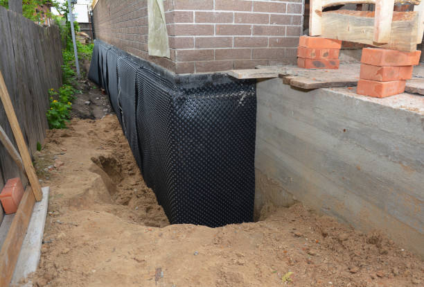 SJ Waterproofing Pros technician performing targeted Vapor Barrier Installation assessment in Port Clinton, OH